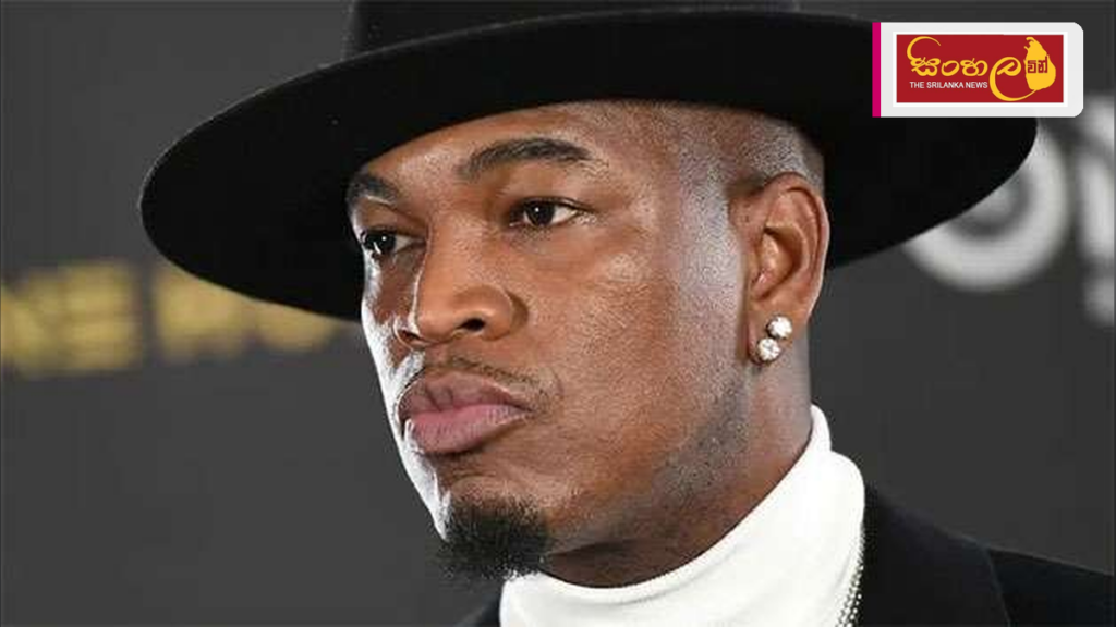 කොළඹ පැවැත්වීමට තිබූ ප්රසංගය අවලංගු වීමෙන් පසු Ne-Yo ට එරෙහිව නීතිමය පියවර Headline: කොළඹ පැවැත්වීමට තිබූ ප්රසංගය අවලංගු වීමෙන් පසු Ne-Yo ට එරෙහිව නීතිමය පියවර Intended image subject: American singer Ne-Yo performing on stage Story summary: කොළඹදී පැවැත්