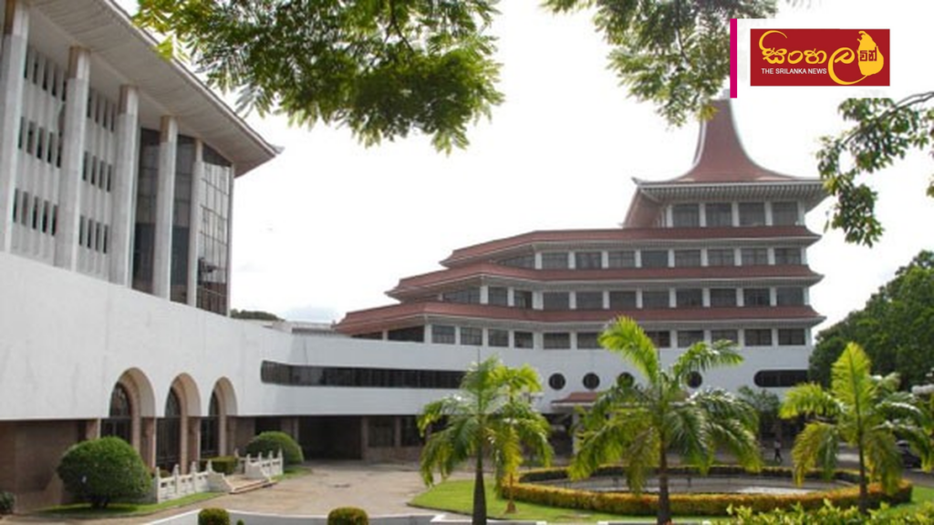 දිවුරුම් ප්රකාශ පරිවර්තක විභාගය සඳහා අයදුම්පත් කැඳවීම සහ නවතම තොරතුරු Headline: දිවුරුම් ප්රකාශ පරිවර්තක විභාගය සඳහා අයදුම්පත් කැඳවීම සහ නවතම තොරතුරු Intended image subject: Ministry of Justice Sri Lanka building Story summary: ශ්රී ලංකා අධිකරණ අමා