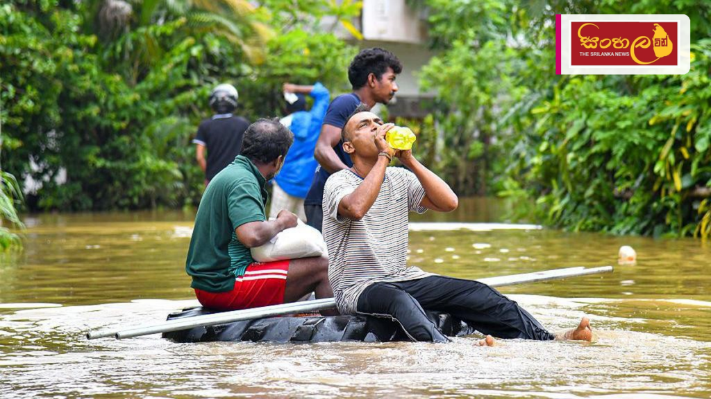 Headline: අයහපත් කාලගුණයෙන් පුද්ගලයින් 1,616කට පීඩා Intended image subject: Flood affected area and emergency relief operations Story summary: දිවයින පුරා පවතින අයහපත් කාලගුණික තත්