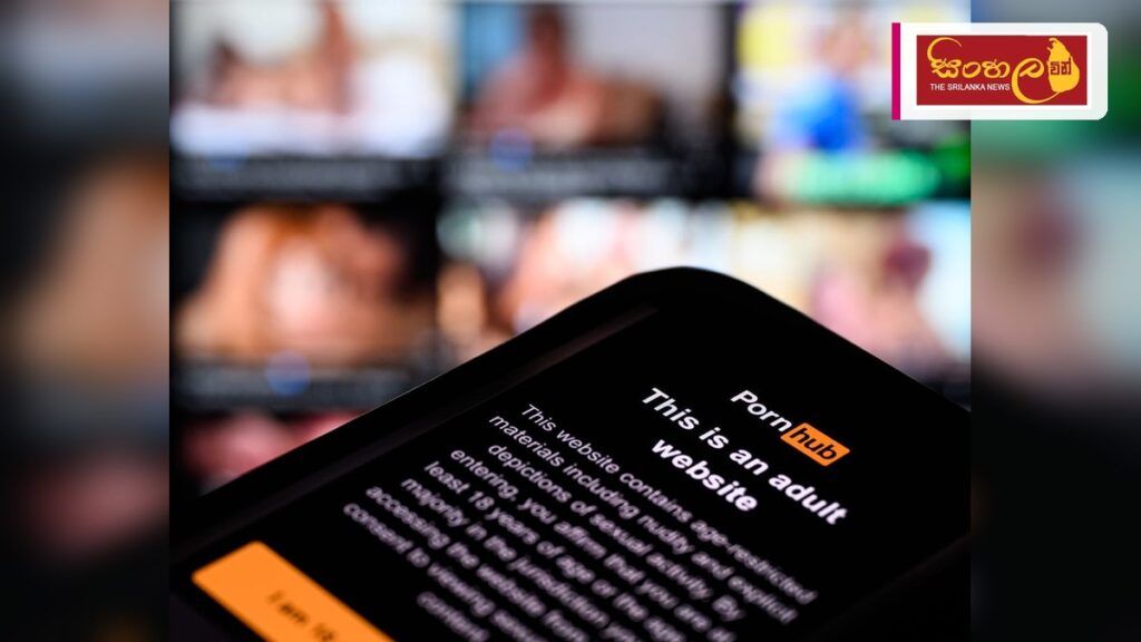 ඔස්ට්රේලියාවේ Pornhub සේවාව යළි ඇරඹේ – Apple උපාංග හිමියන්ට පමණක් අවස්ථාව Headline: ඔස්ට්රේලියාවේ Pornhub සේවාව යළි ඇරඹේ - Apple උපාංග හිමියන්ට පමණක් අවස්ථාව Intended image subject: Apple device displaying age verification screen Story summary: වයස් සත්